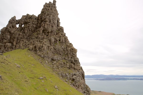 Old Man of Storr which includes tranquil scenes, a monument and a lake or waterhole