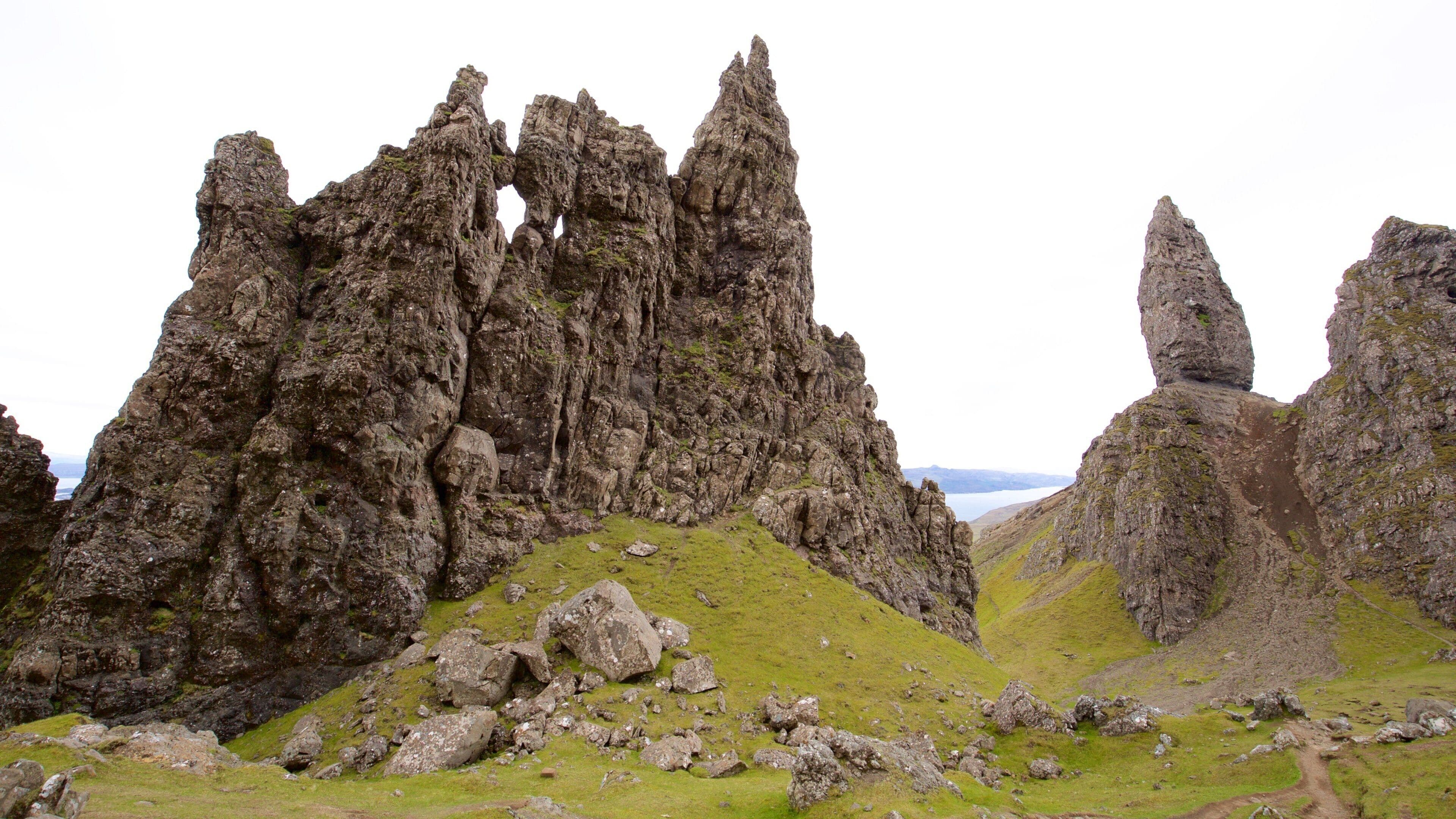 Old Man of Storr featuring mountains and tranquil scenes