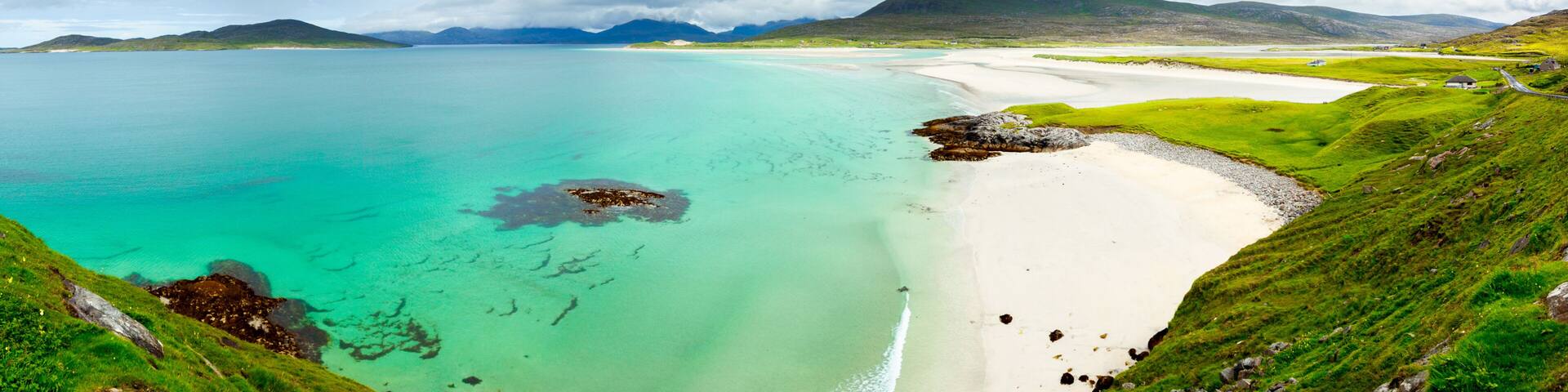 Panoramic view of Luskentyre white beaches under dramatic sky, Isle of Harris, Scotland