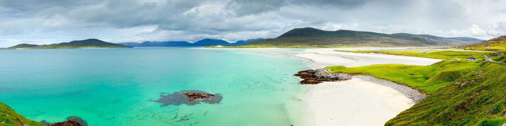 Panoramic view of Luskentyre white beaches under dramatic sky, Isle of Harris, Scotland