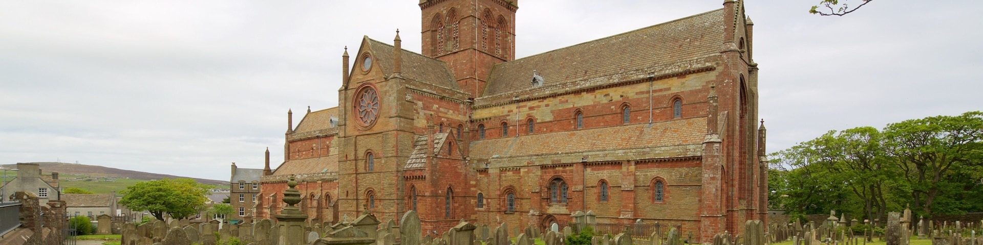 St. Magnus Cathedral showing heritage architecture, a cemetery and a church or cathedral