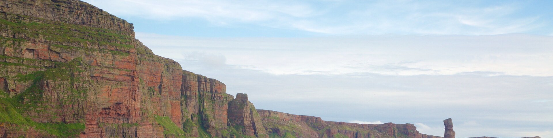 Old Man of Hoy featuring rocky coastline