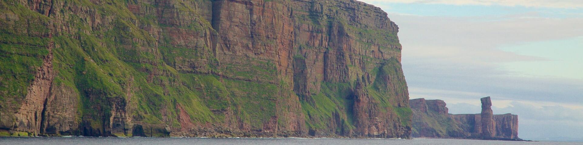 St. John\'s Head featuring mountains and rugged coastline