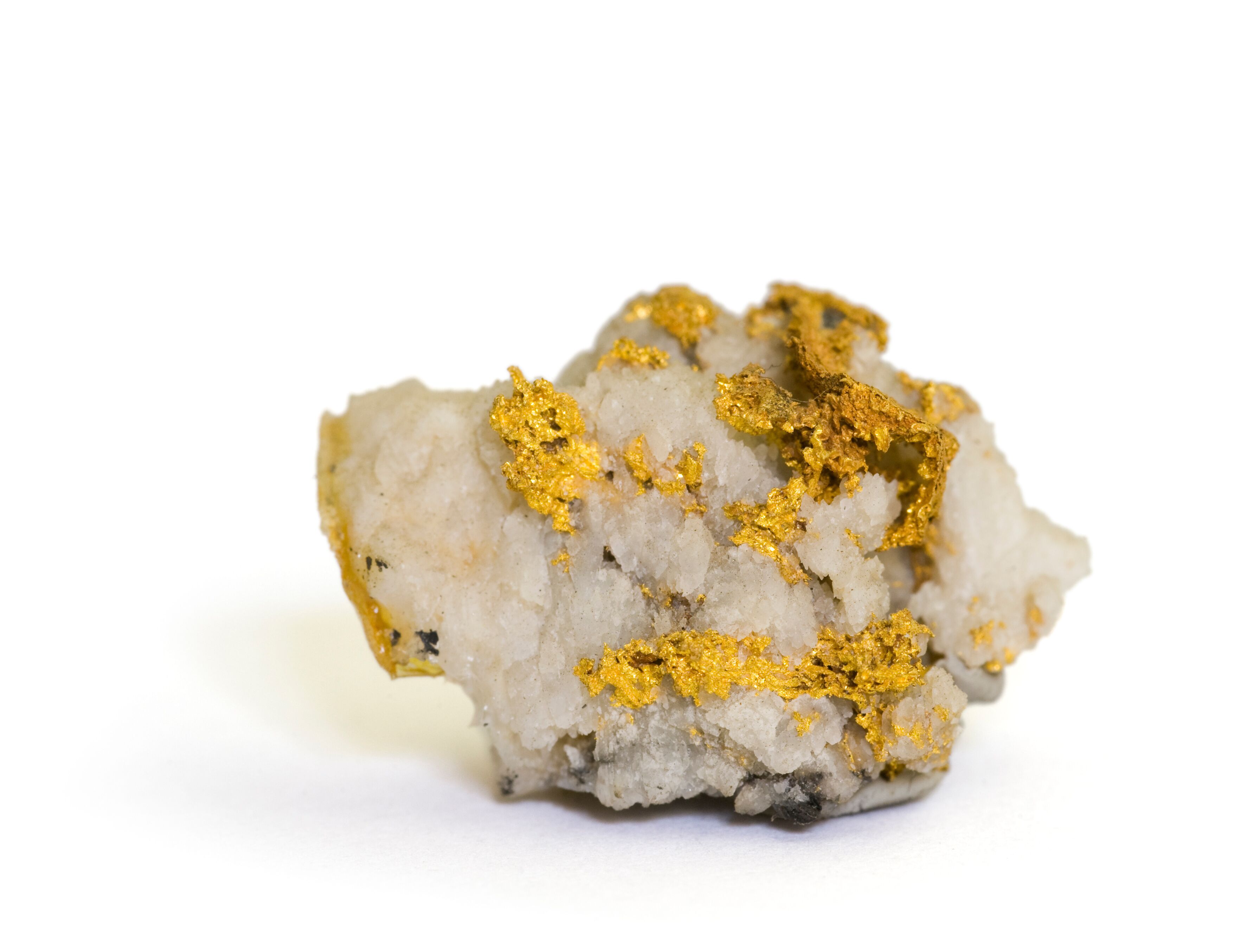 Native gold on quartz from Sonora, California. 2.6cm across.
