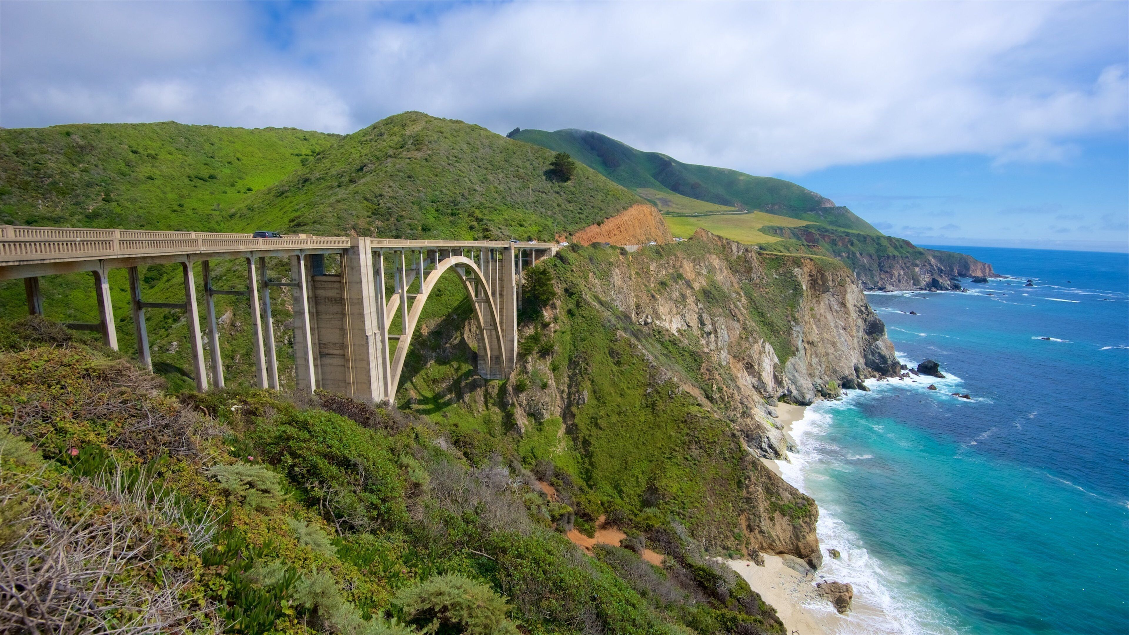 Bixby Bridge which includes rocky coastline, general coastal views and a bridge
