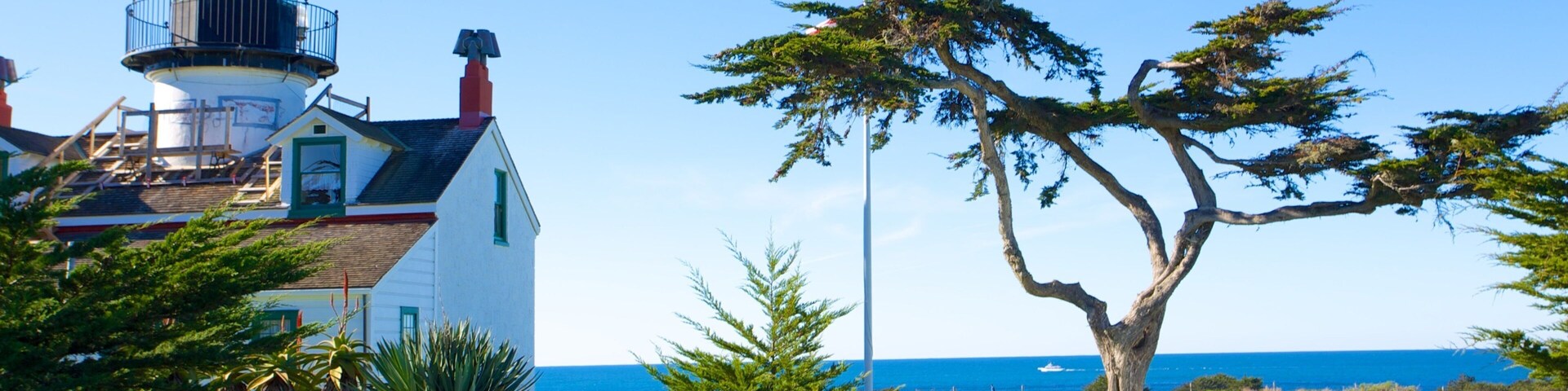 Point Pinos Lighthouse featuring a lighthouse, general coastal views and heritage architecture