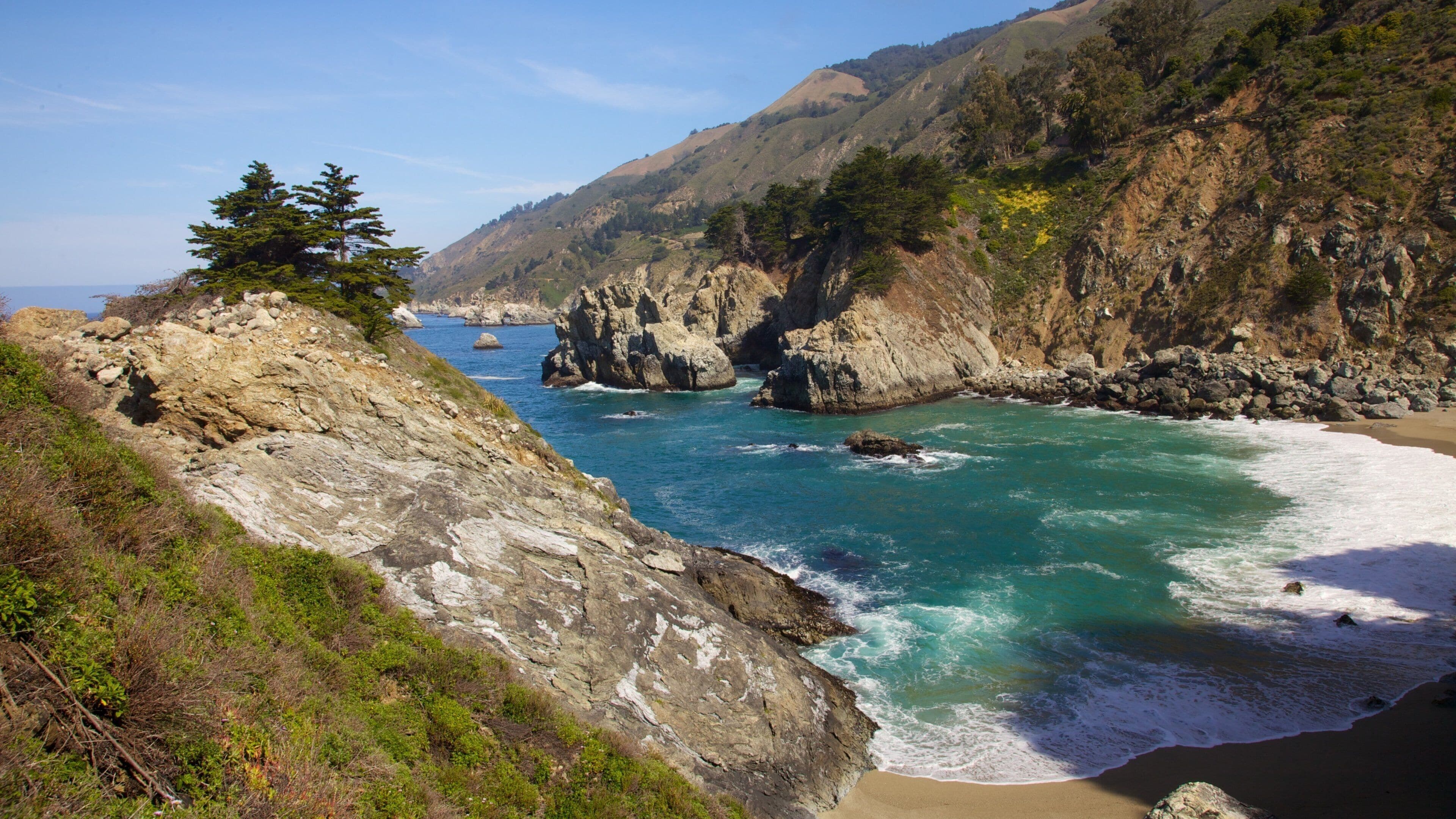 Pfeiffer Big Sur State Park featuring landscape views, rugged coastline and a river or creek