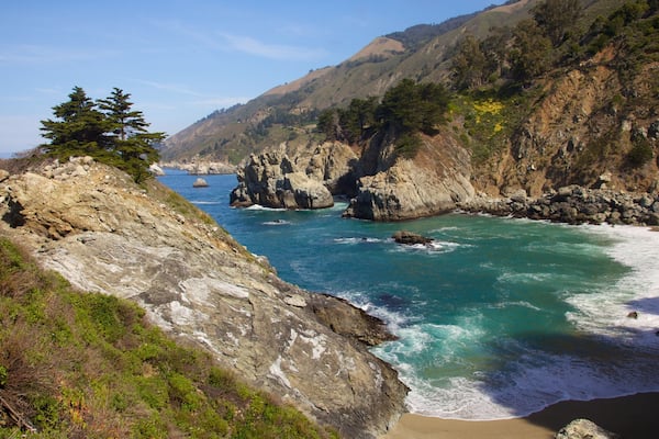 Pfeiffer Big Sur State Park featuring landscape views, rugged coastline and a river or creek