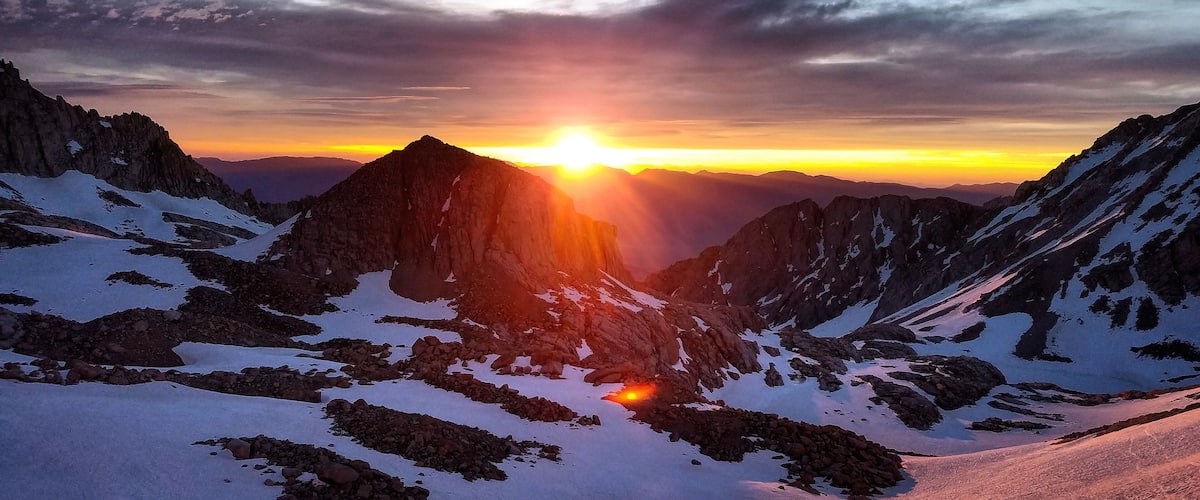 Watching the sunrise on my way up to Mt. Whitney. This is always my favorite part of a climb. When you have been hiking for hours in the dark and  you start to see that glow around 4am.  #adventure