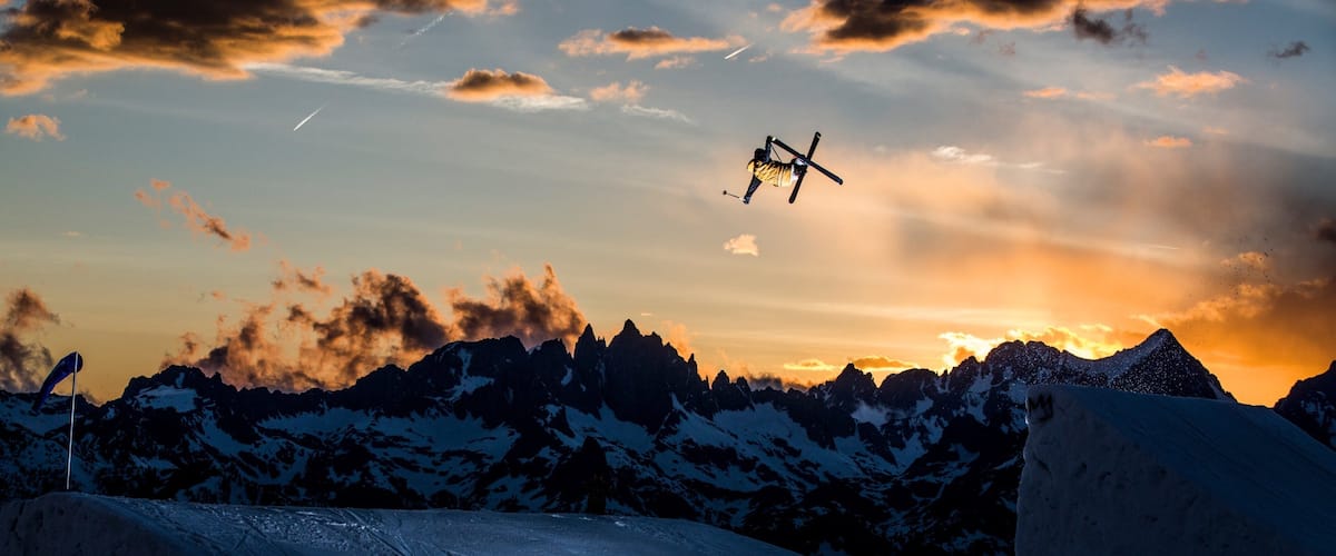Mammoth Mountain Ski Resort which includes snow skiing, a sunset and mountains