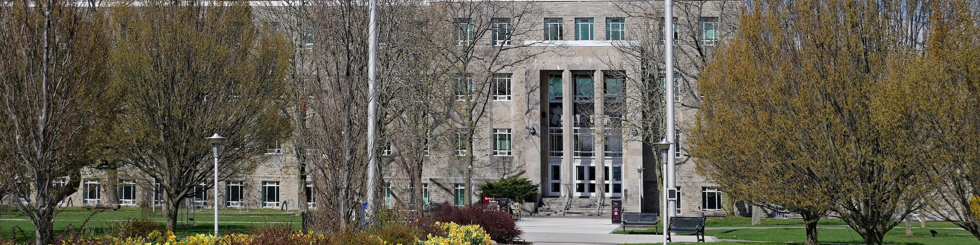 HAMILTON, CANADA - MAY 2019: The campus of McMaster University, with the path leading to the main science building.