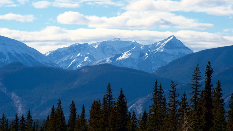 Hinton which includes mountains, snow and tranquil scenes