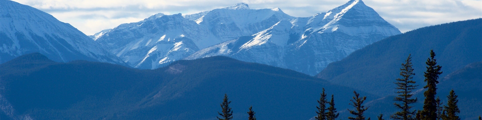 Hinton which includes mountains, tranquil scenes and snow