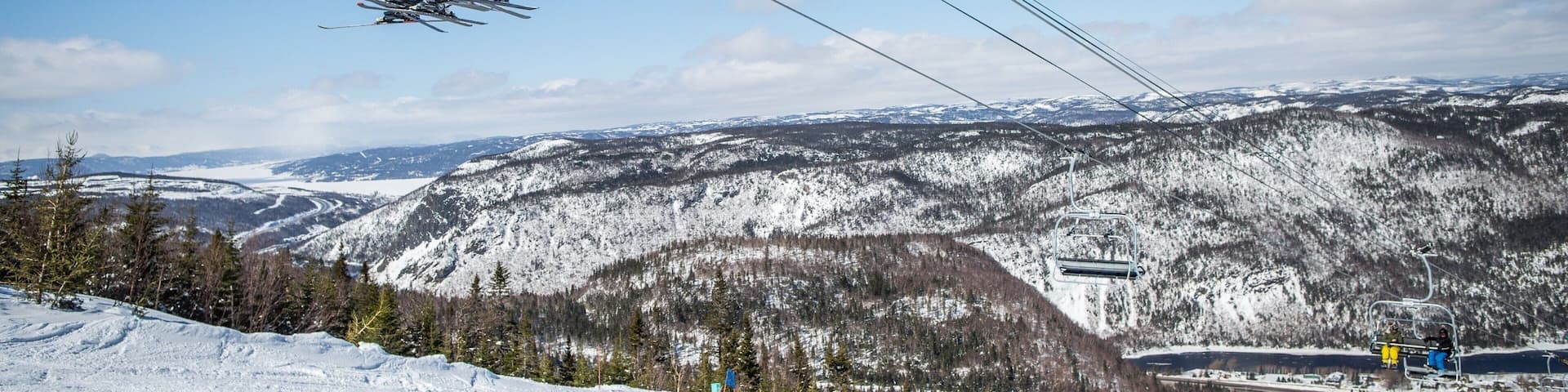 Marble Mountain featuring snow skiing, a gondola and mountains