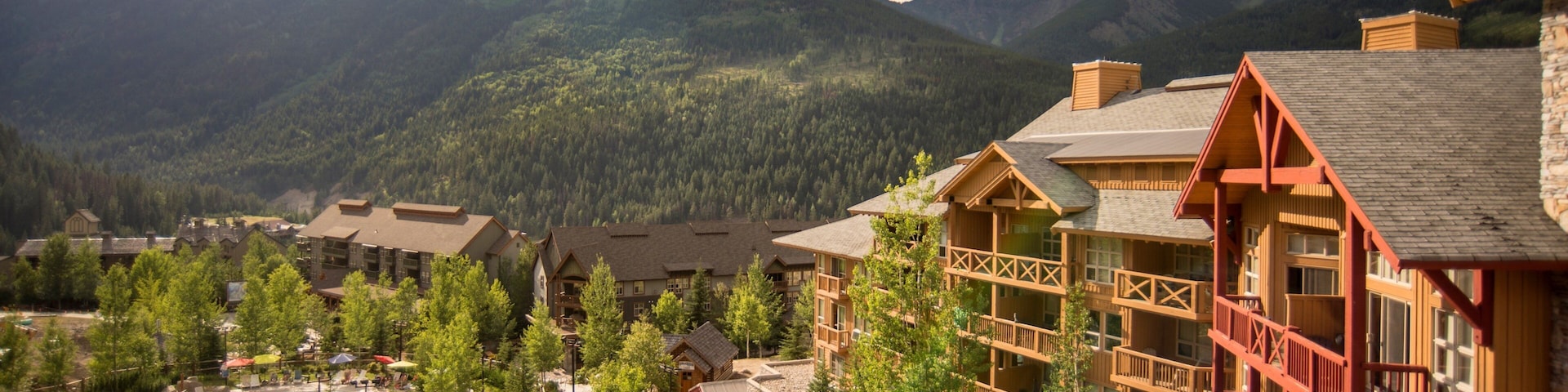 Panorama Mountain Ski Area which includes a small town or village, mountains and a luxury hotel or resort