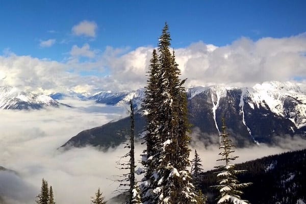 Incredible view from the back side of Mt MacKenzie at Revelstoke Mountain Resort. I spent the day ski touring to reach this beautiful view of the Illecillewaet river valley, which is buried under the thick layer of clouds. #winterwonders