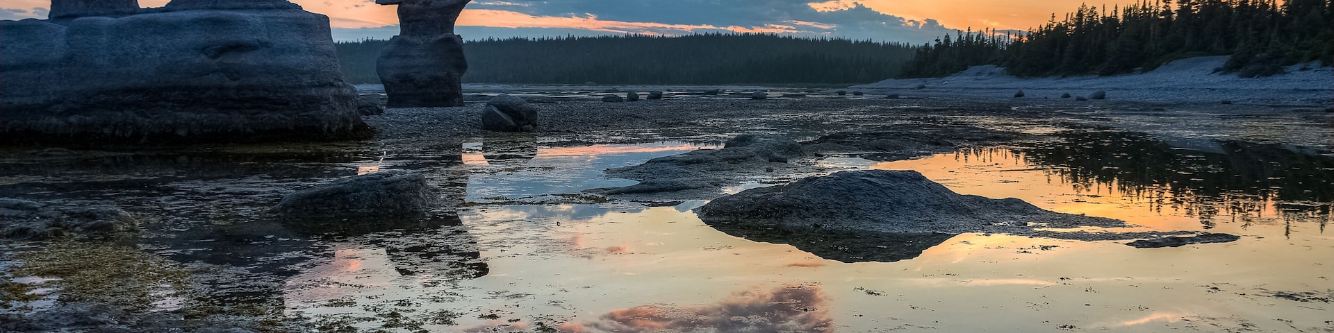 Beautiful sunset over Mingan archipelago and its famous monoliths, Quebec, Canada