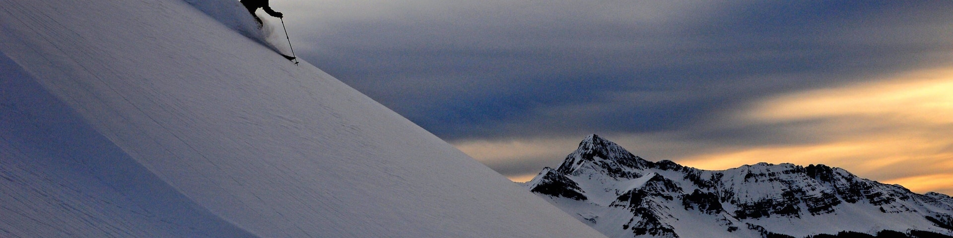 Telluride Ski Resort featuring snow skiing, snow and mountains