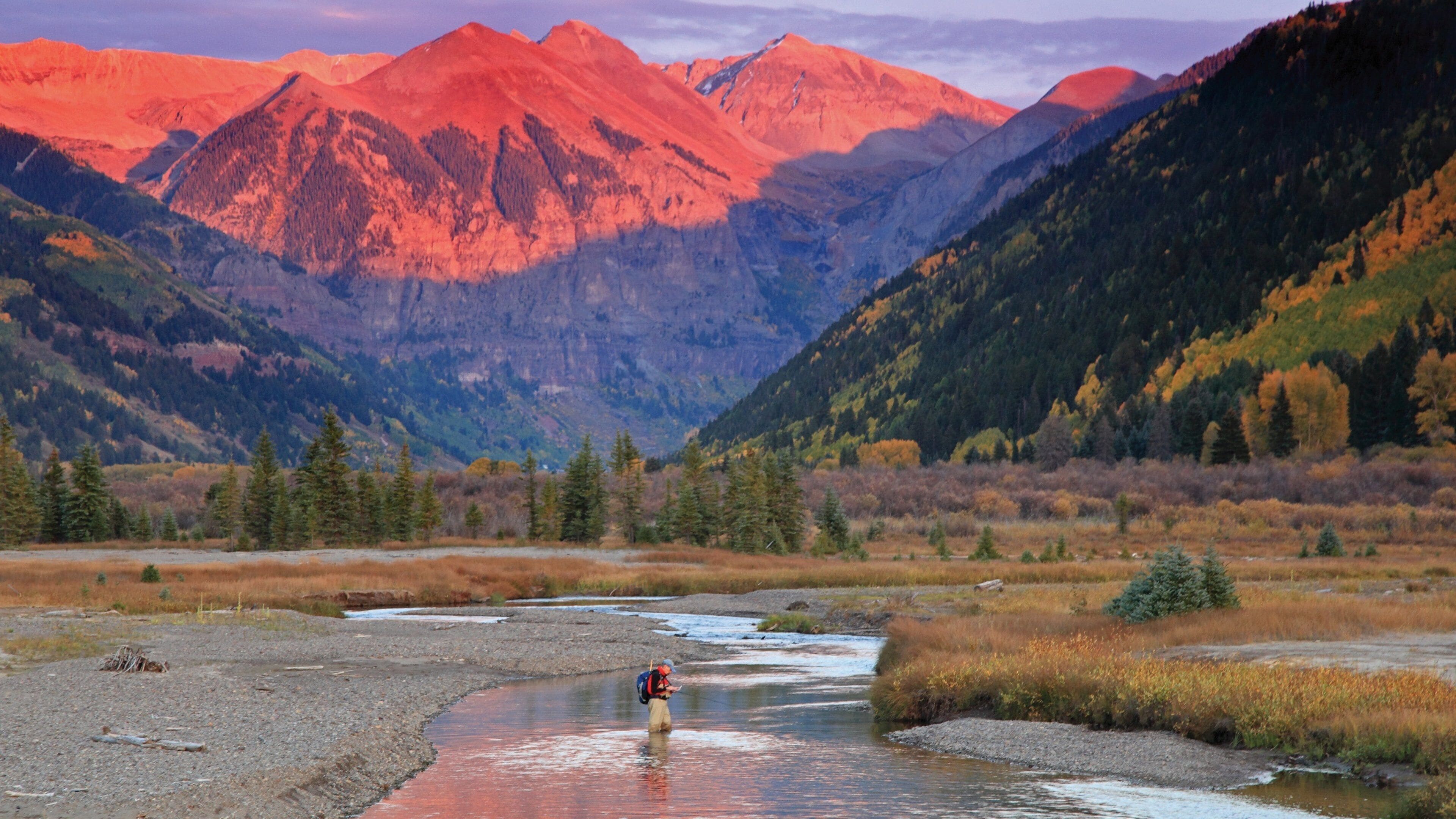 Telluride Ski Resort showing a river or creek, a sunset and hiking or walking