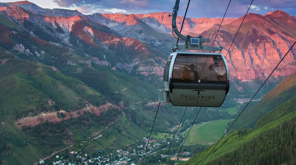 Telluride Ski Resort showing landscape views, a gondola and a sunset