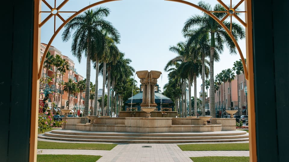 Mizner Park which includes a park and a fountain