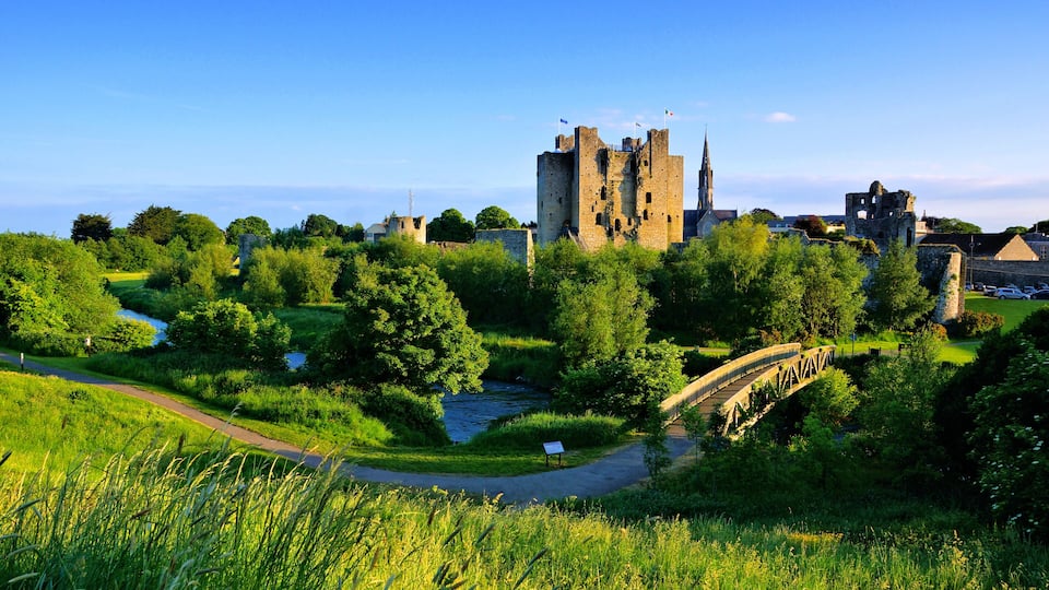 Historic Trim Castle with foot bridge. Late day light, County Meath, Ireland