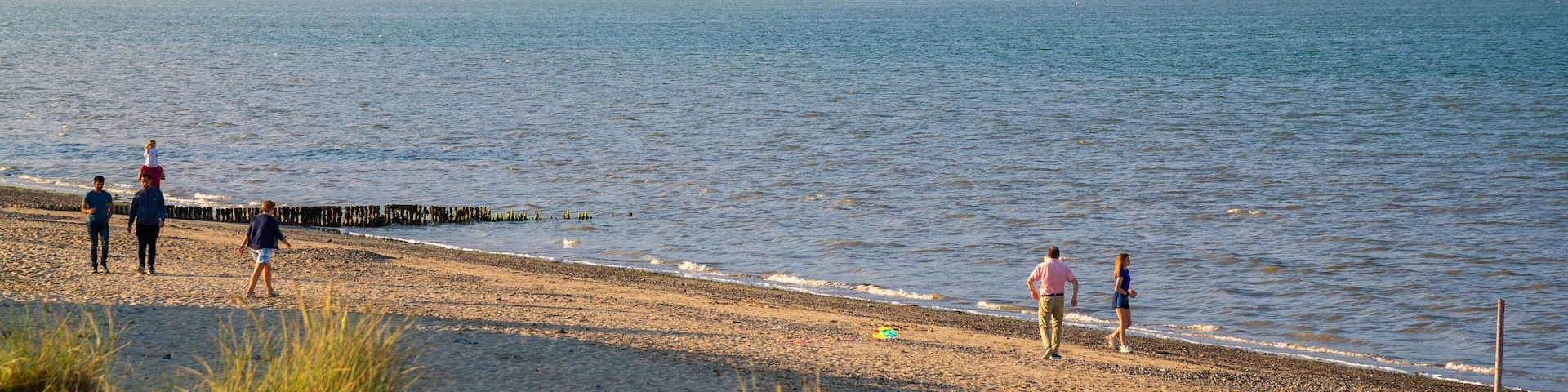 Rosslare Beach featuring a sunset, a beach and general coastal views