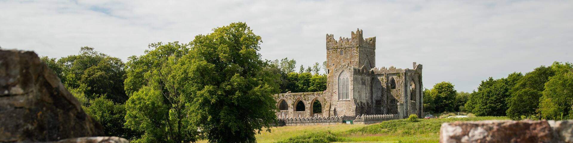 Tintern Abbey featuring heritage architecture and a ruin