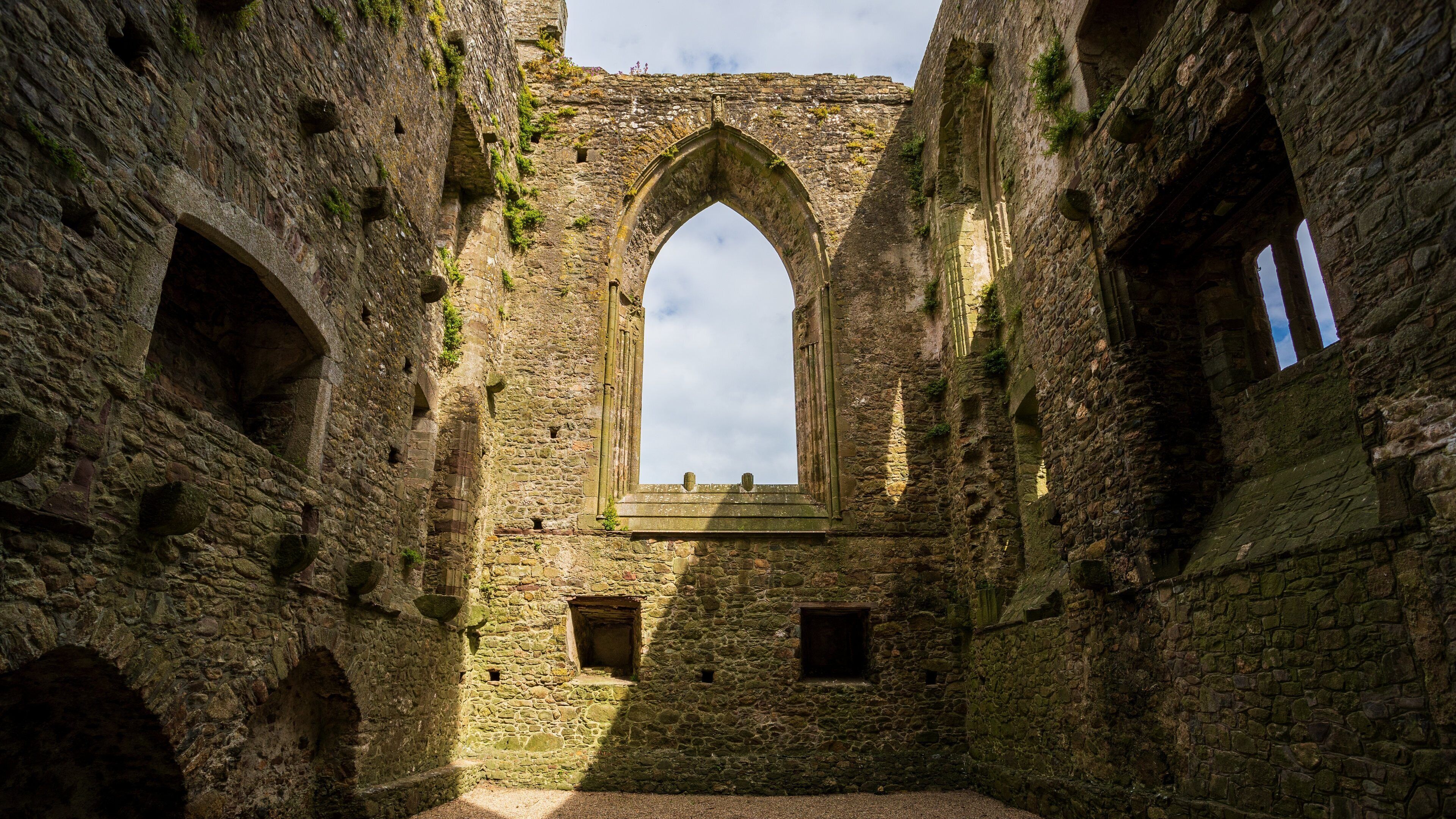 Tintern Abbey featuring heritage architecture and building ruins