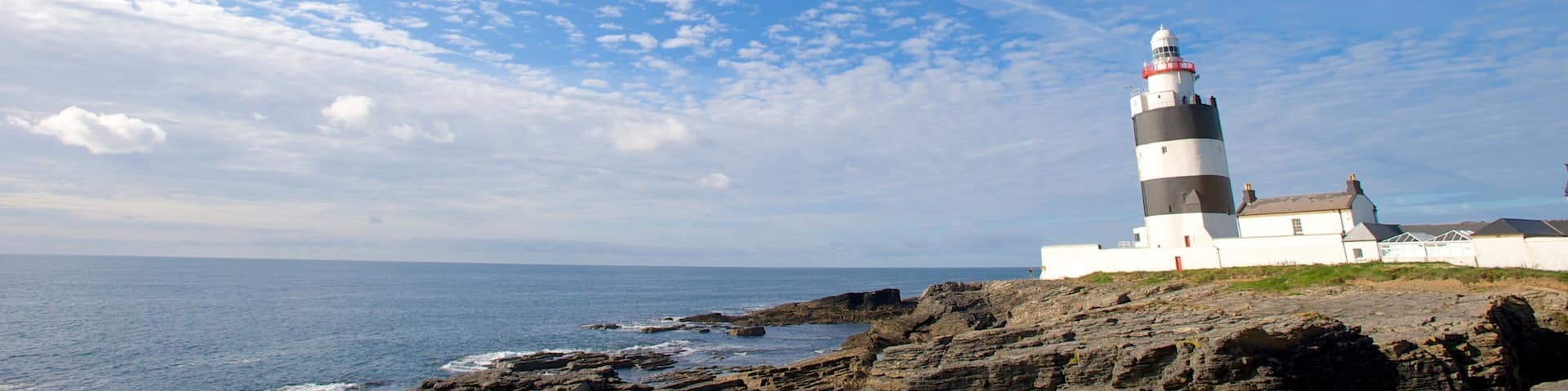 New Ross featuring a lighthouse, heritage architecture and views