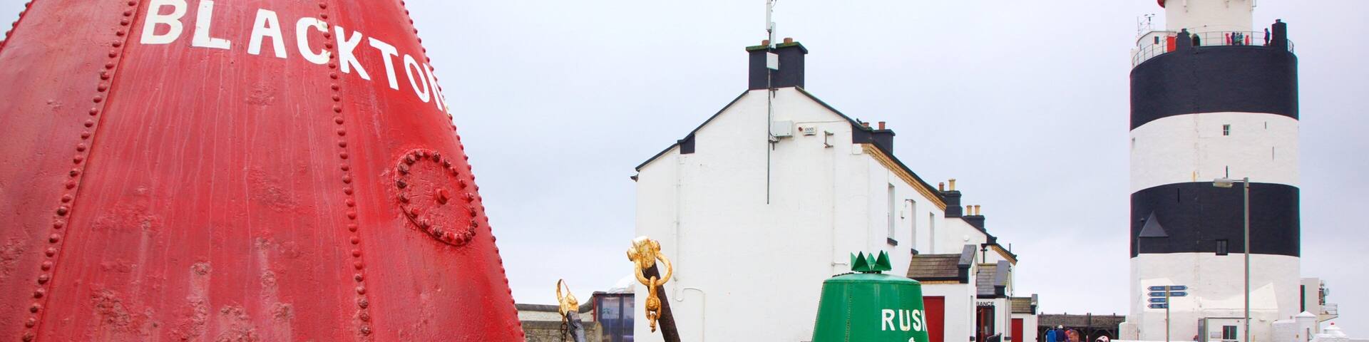 Hook Lighthouse which includes street scenes