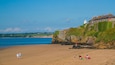 Duncannon Beach which includes rugged coastline, a sandy beach and general coastal views