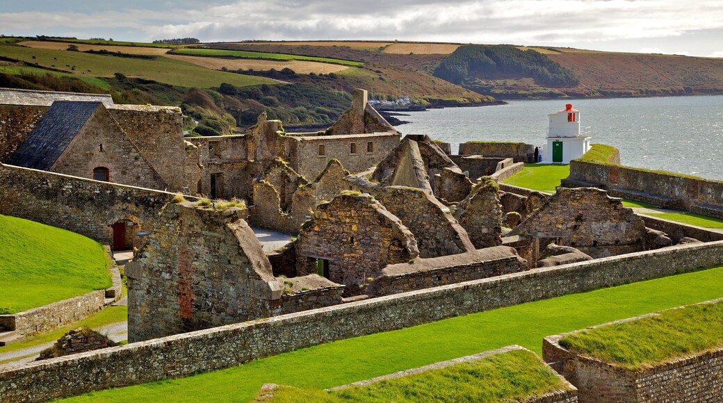 Charles Fort featuring building ruins, a coastal town and general coastal views