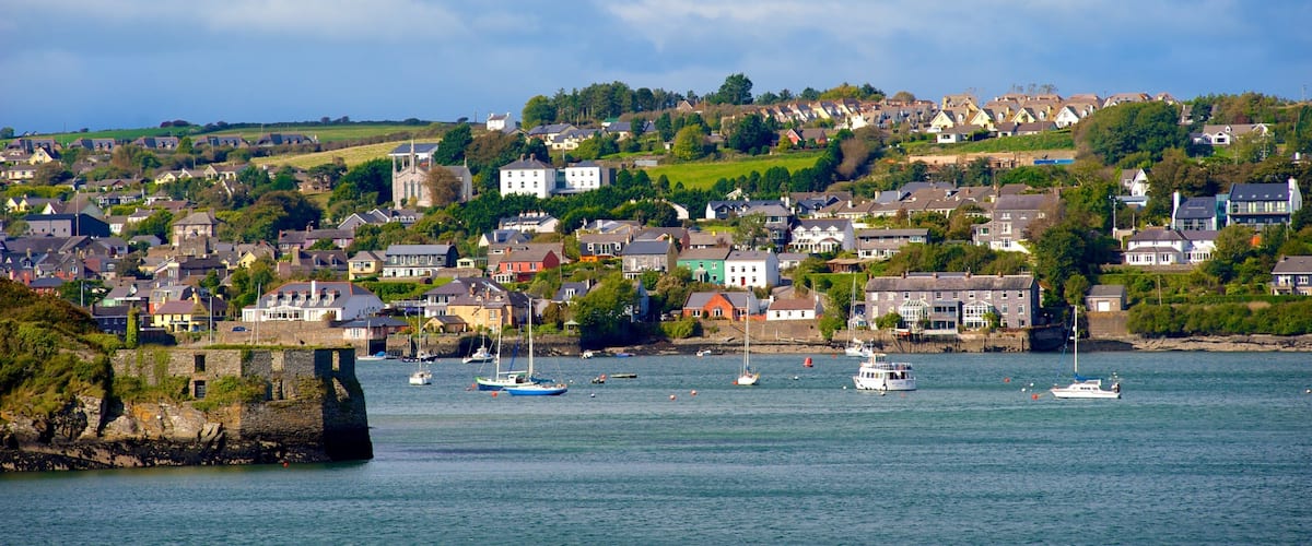 Charles Fort featuring boating, a coastal town and a bay or harbour