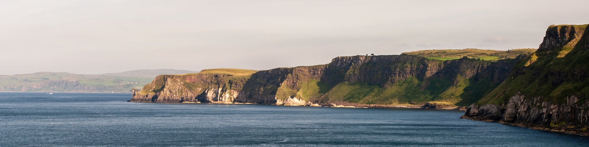 The ocean is calm and the sky is clear