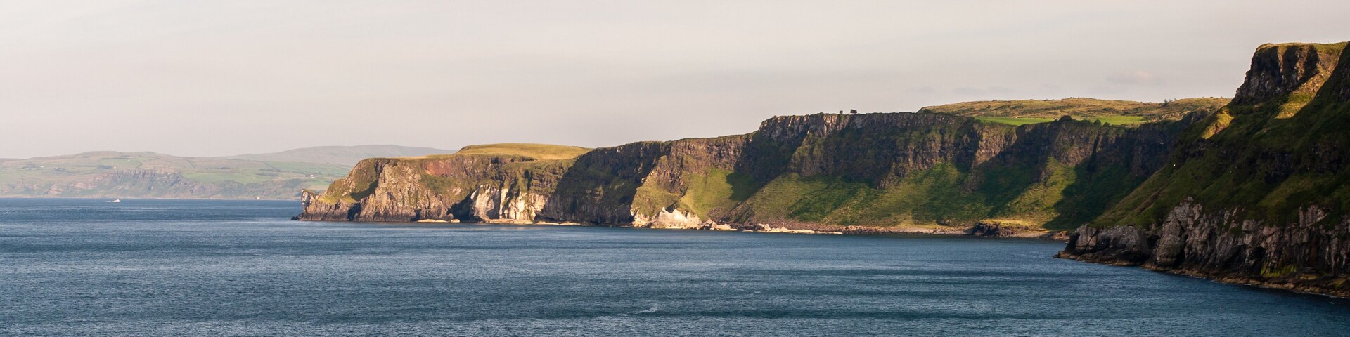 The ocean is calm and the sky is clear