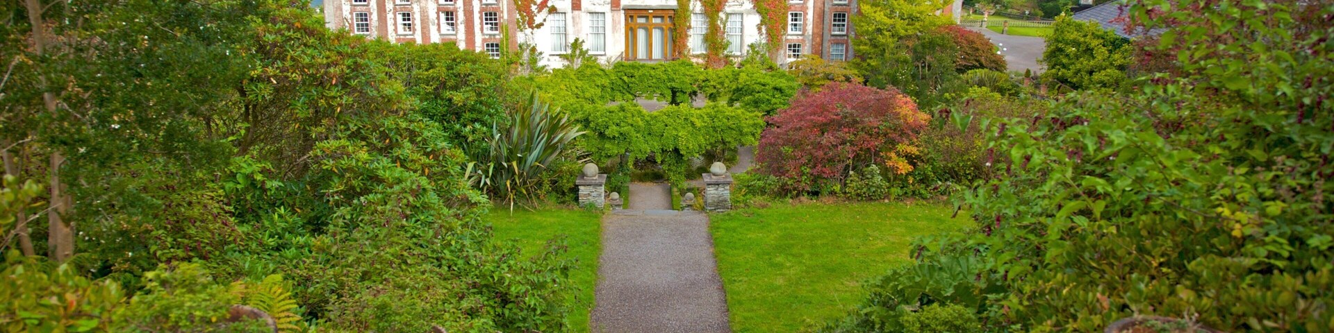Bantry House and Garden featuring chateau or palace, heritage architecture and a garden