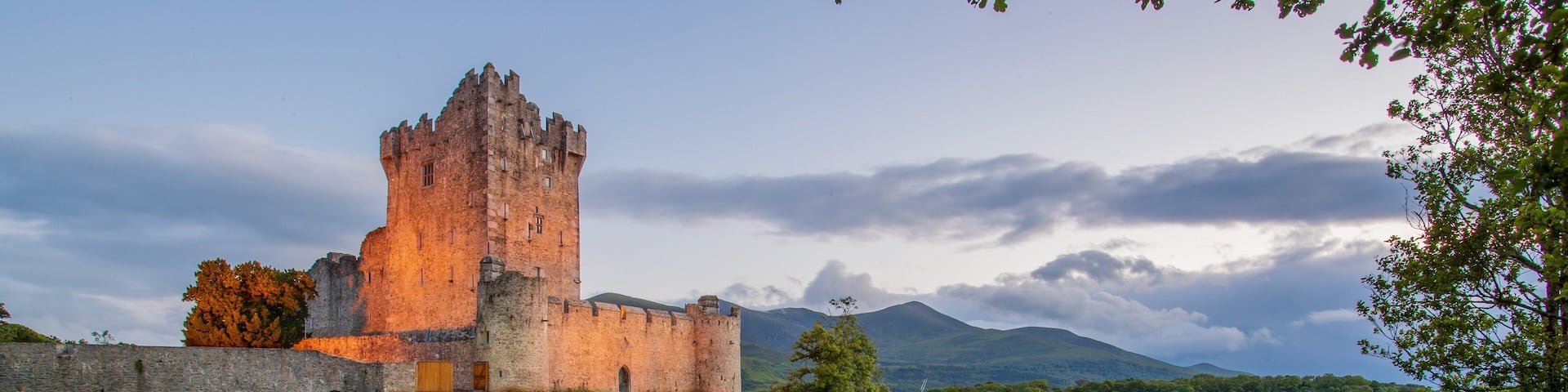 Ross Castle which includes a river or creek, chateau or palace and heritage architecture