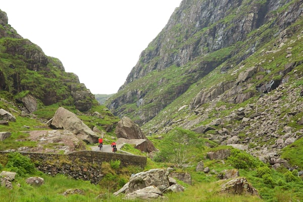 MacGillycuddy\'s Reeks showing tranquil scenes and a gorge or canyon as well as a couple