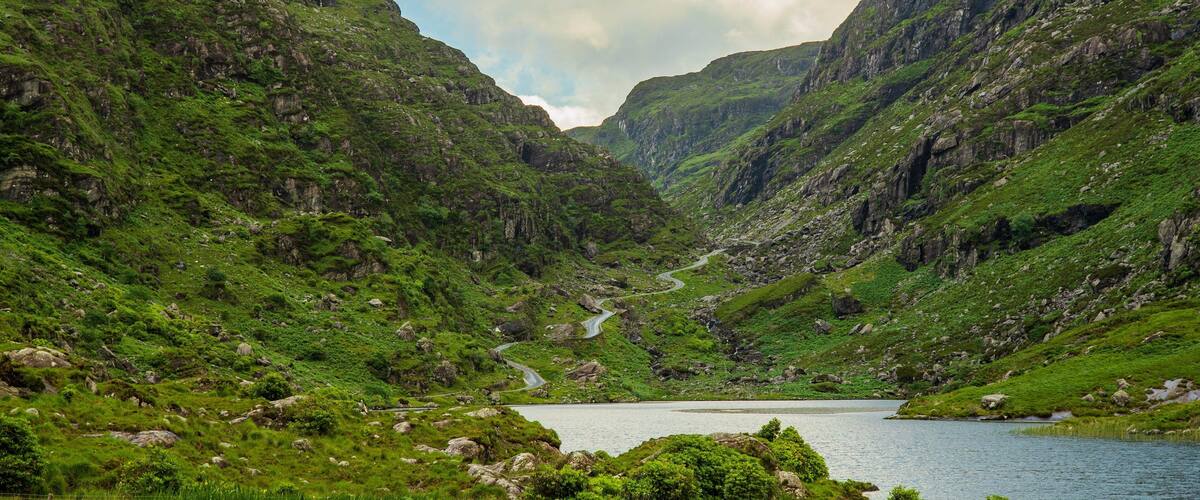 Gap of Dunloe showing tranquil scenes, a lake or waterhole and mountains