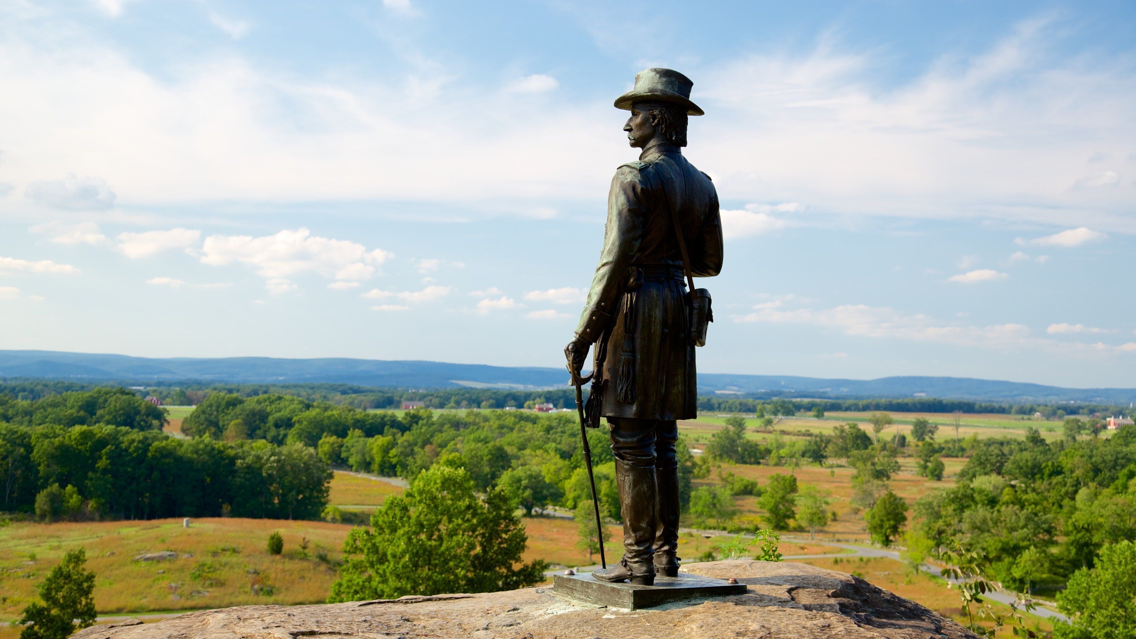 Gettysburg National Military Park featuring military items, landscape views and heritage elements