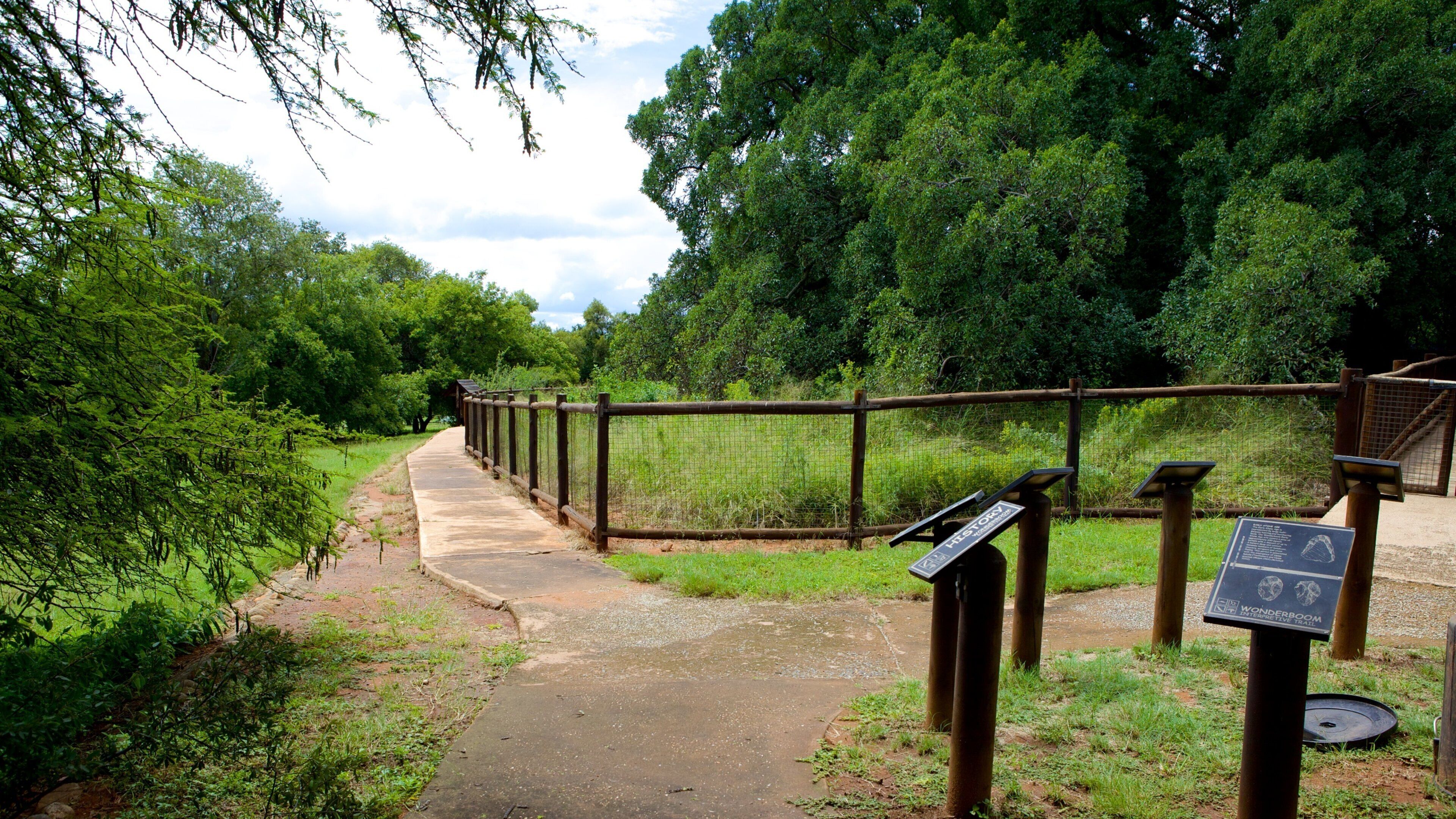 Wonderboom Nature Reserve featuring landscape views, a garden and signage