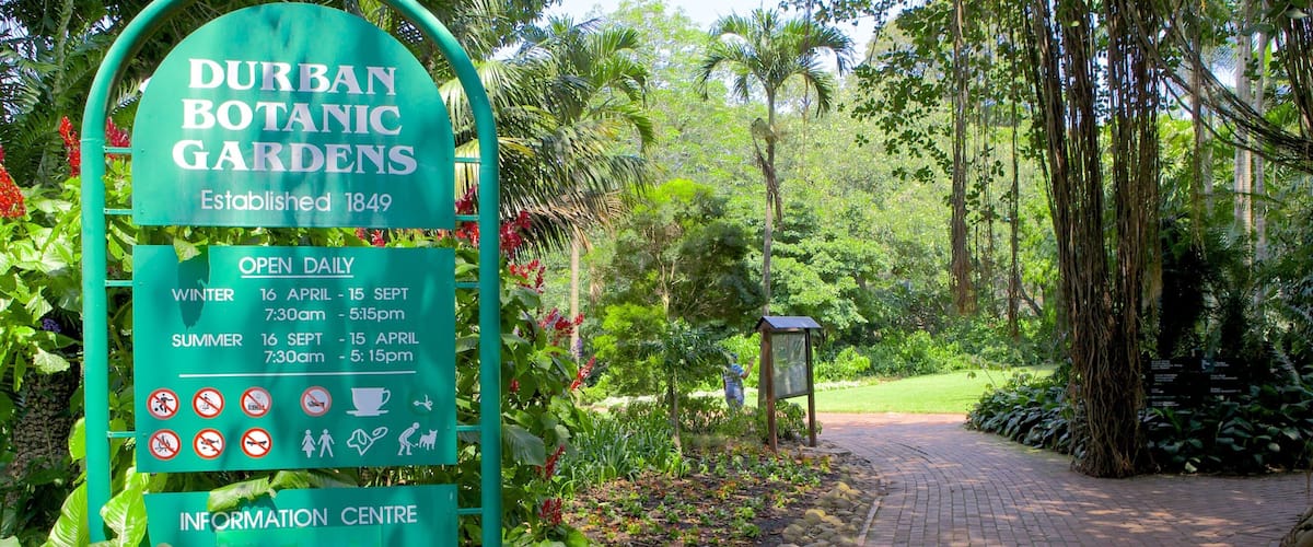 Durban Botanical Gardens which includes signage and a garden