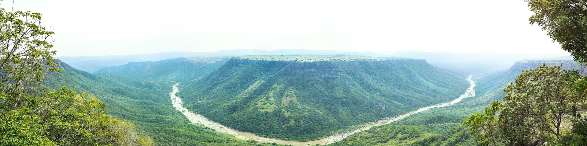 Oribi Gorge Nature Reserve panoramic view. KwaZulu-Natal, South Africa Tourism destination. Scenic landscape panorama of river, gorge and mountains.