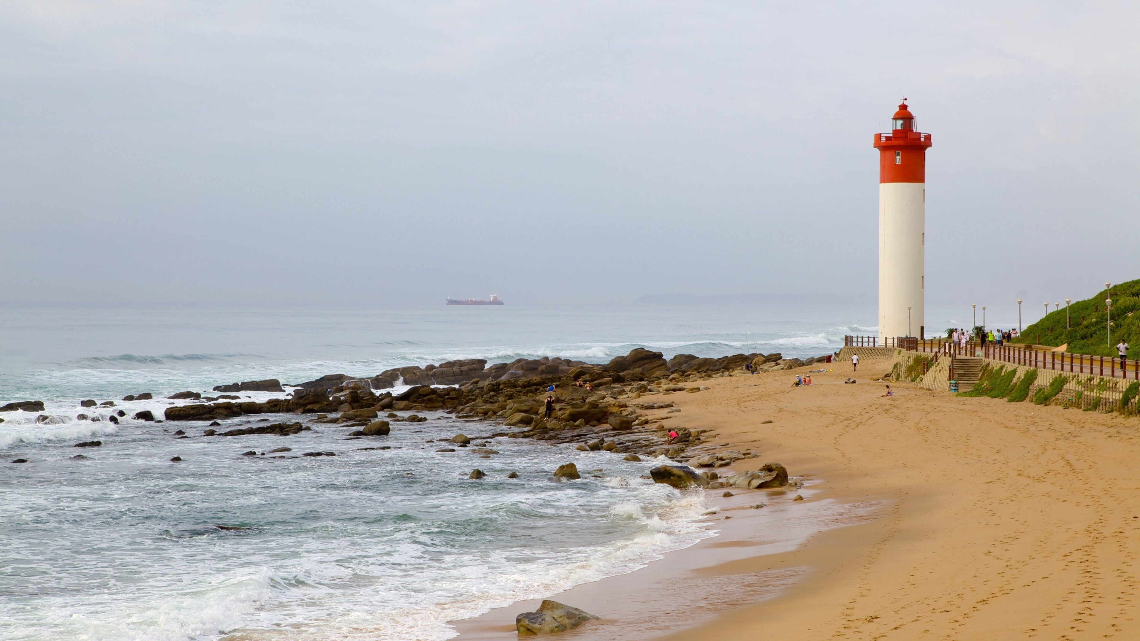 Umhlanga Rocks Beach showing a beach, landscape views and a lighthouse