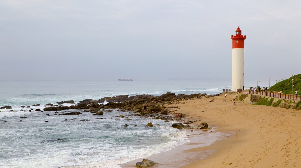 Umhlanga Rocks Beach showing a beach, landscape views and a lighthouse