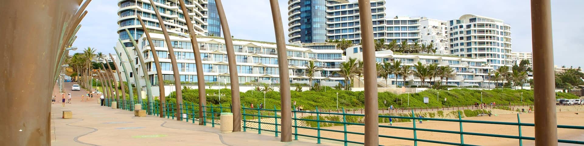 Umhlanga Rocks Beach showing a city, a skyscraper and a hotel