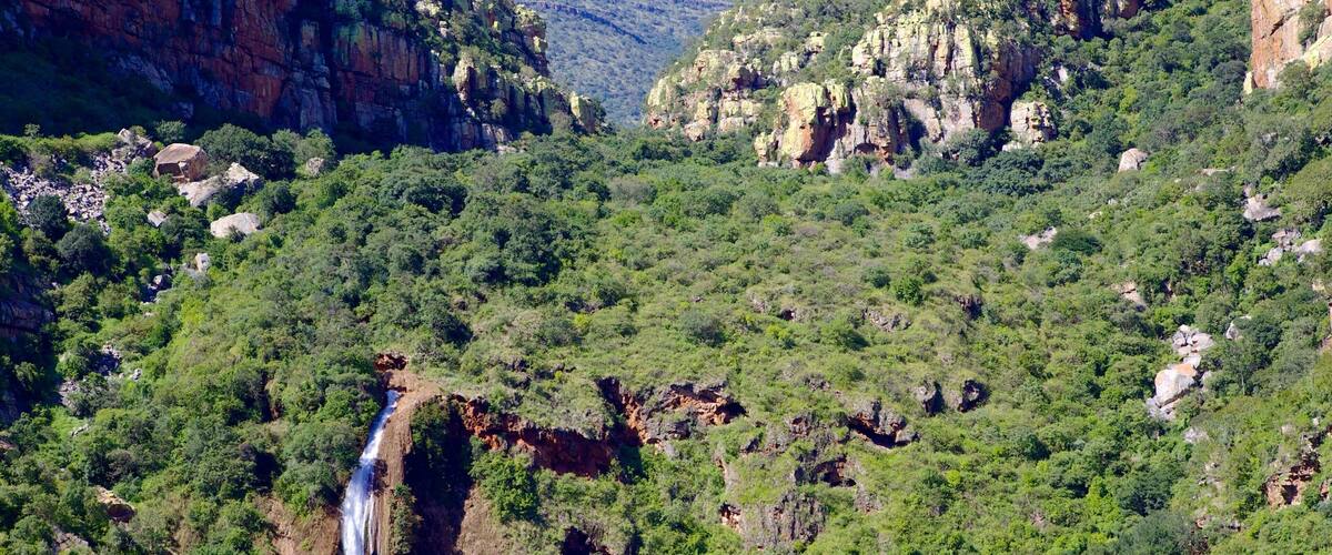 Mpumalanga - Limpopo featuring a cascade, a gorge or canyon and landscape views