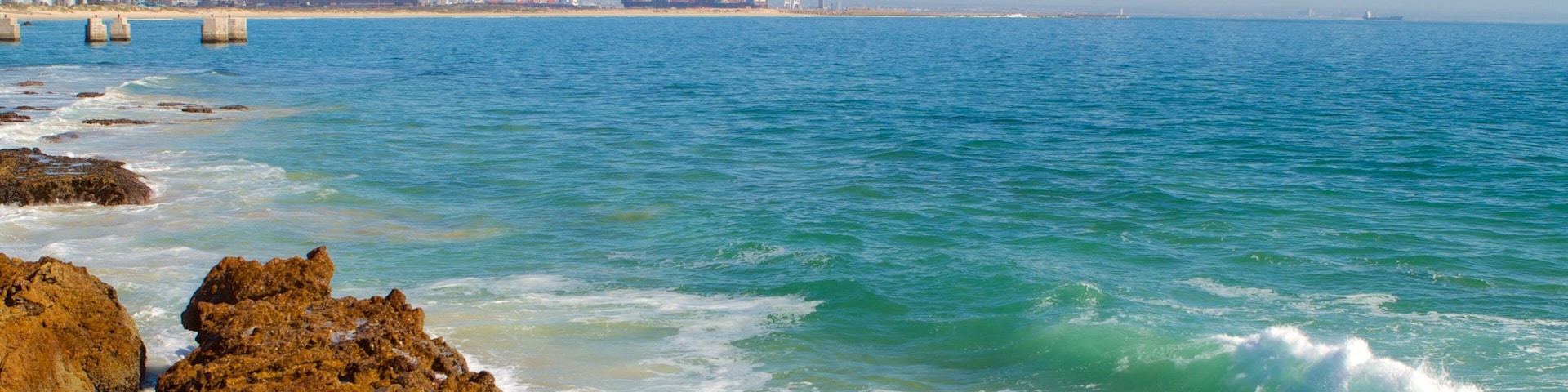 Hobie Beach showing rugged coastline, general coastal views and landscape views