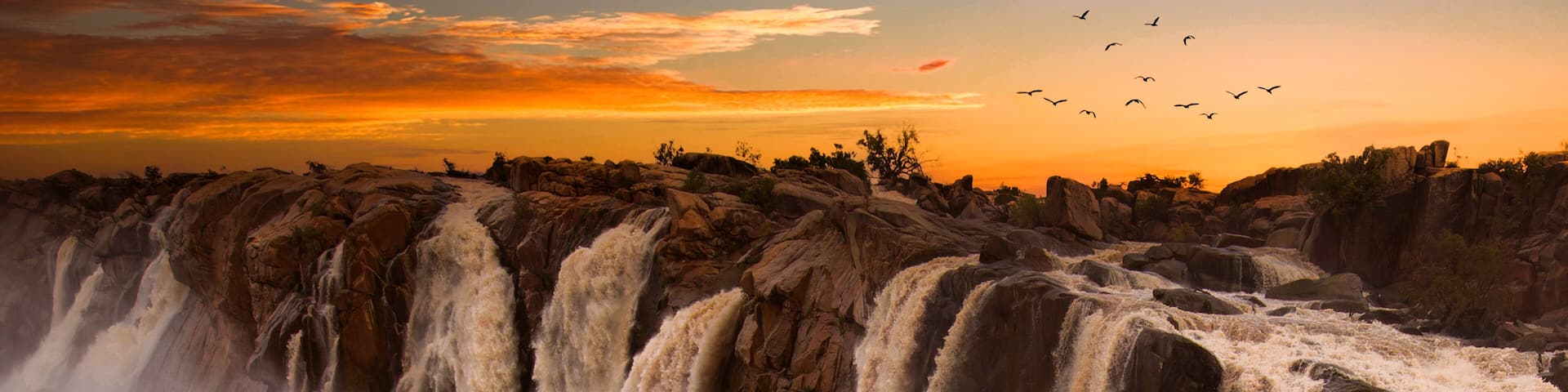 Augrabies water fall, raging water and full color sunsets
